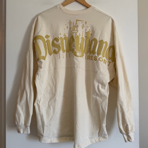 SPIRIT JERSEY Tops - Disneyland Ivory Gold Castle Spirit Jersey size Large AS IS